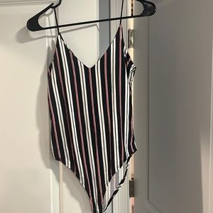 Blue, white and red striped bodysuit. Fits size small or medium.